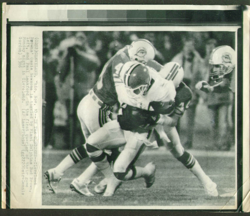 Cleveland Browns? Ossie Newsome is tackled by Miami Dolphins Bud