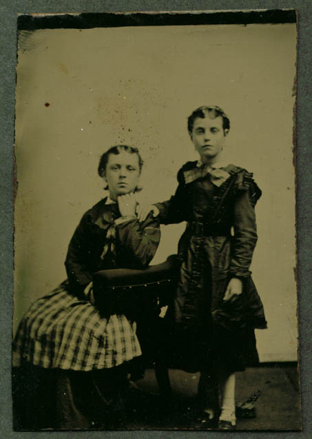 2 sisters chin to hand on shoulder twins? Tintype 1860s