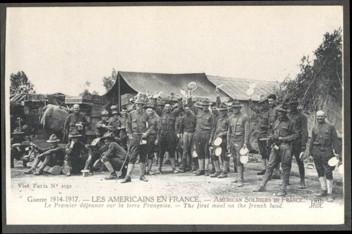 Americans in France 1914-1917 Soldiers raise plates 1st meal postcard 1917